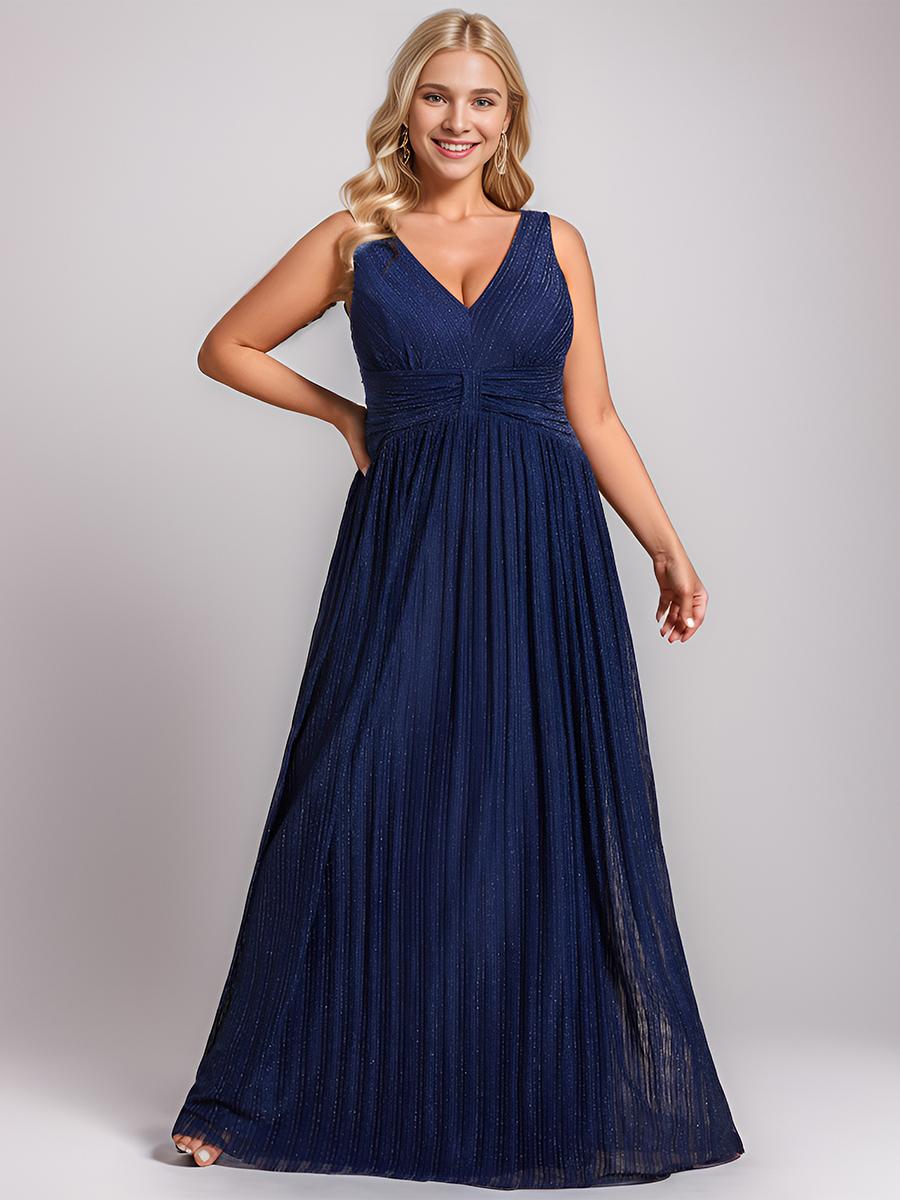 

Всегда красивое женское вечернее платье больших размеров с v-образным вырезом без рукавов, трапециевидной формы и ампирной талией, с легким блеском 9XL темно-синий