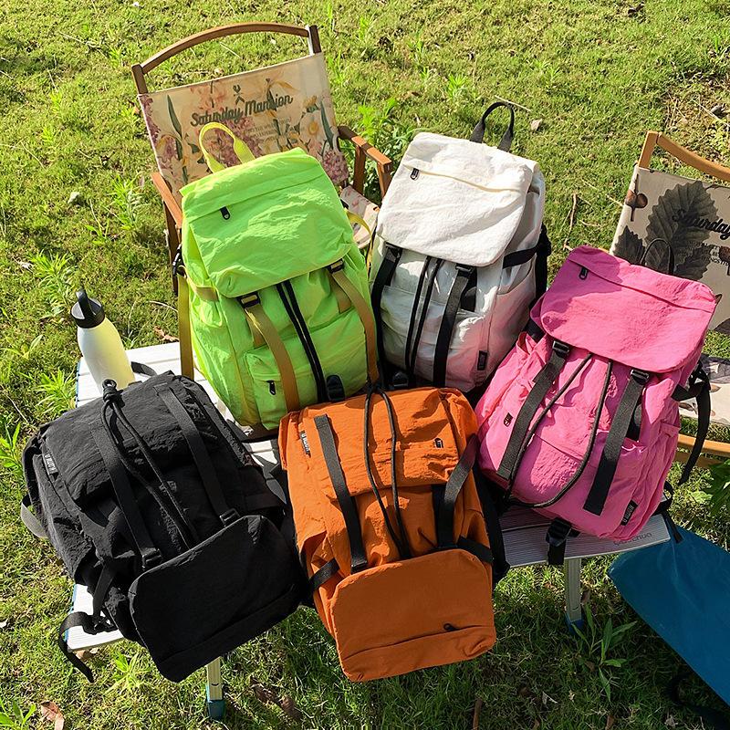 Japanese ins style school bag female college student outdoor mountaineering trip backpack light and versatile boy high school student backpack