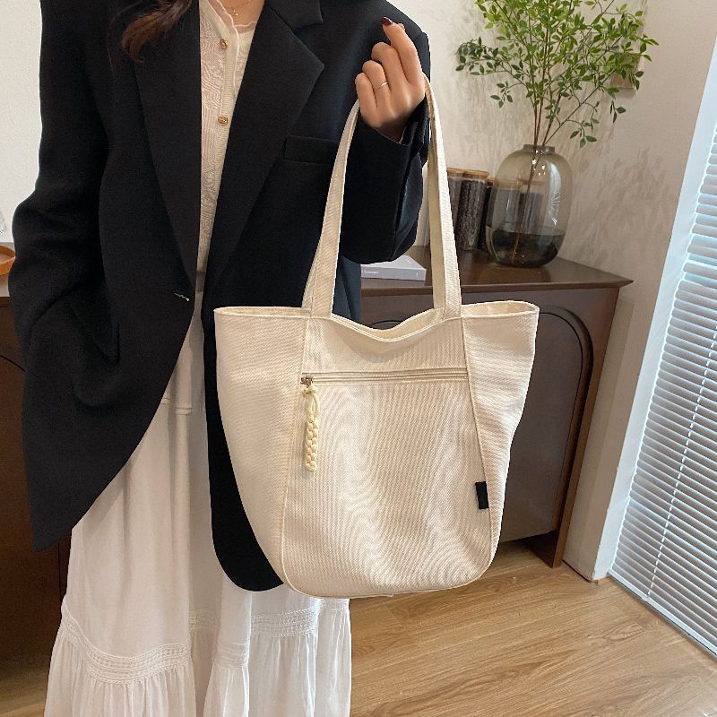Customized bags for women 2025 new large-capacity tote bags, commuter tote bags, student women's shoulder bags.