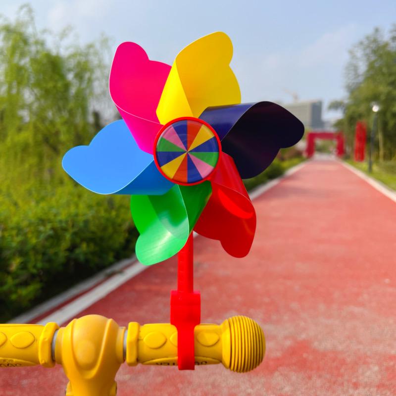 

Seven-Color Spinning Pinwheel - Kids Scooter & Stroller Toy