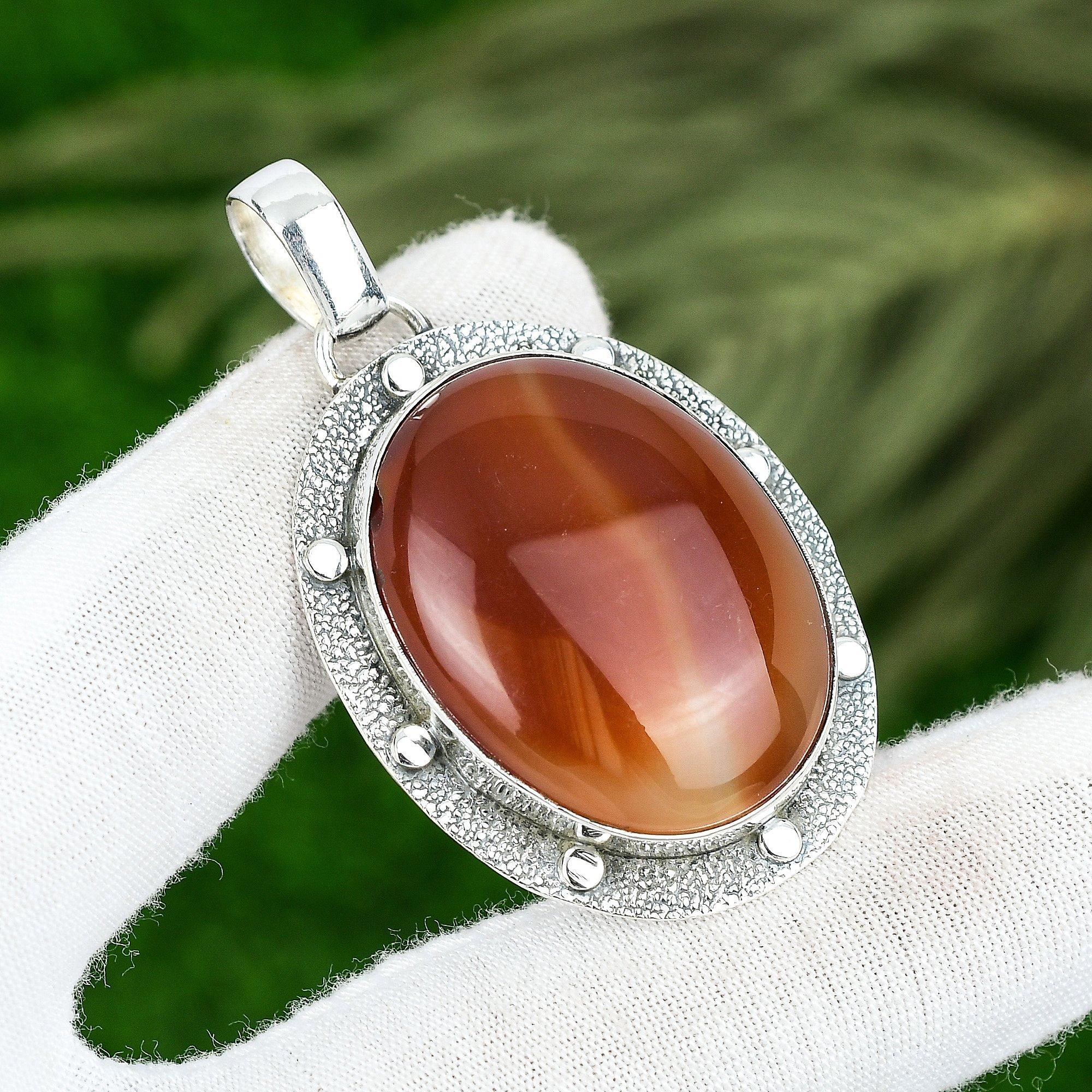 

Распродажа ко Дню памяти Овальный натуральный монтский агат в безеле Подвеска Ювелирное изделие Серебро 925 пробы