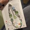 INS Phone Charm Summer Fresh Four-Leaf Clover Beaded Phone Strap Camera CCD Chain Bag Wrist Rope Pendant