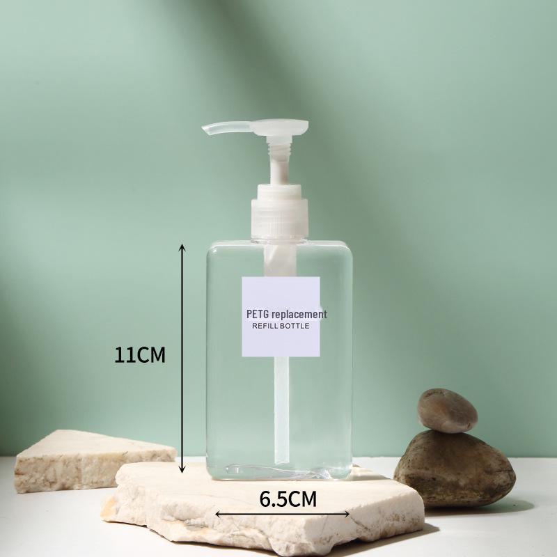 Tragbares Reiseflaschenset für Toilettenartikel - Druckspender mit großer Kapazität für Seife, Shampoo und Lotion