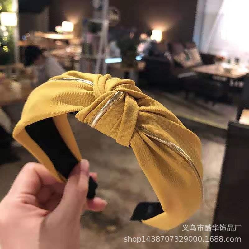 Fabric headband female Yiwu headdress jewelry autumn and winter feeling wide edge versatile high skull top headband hairpin