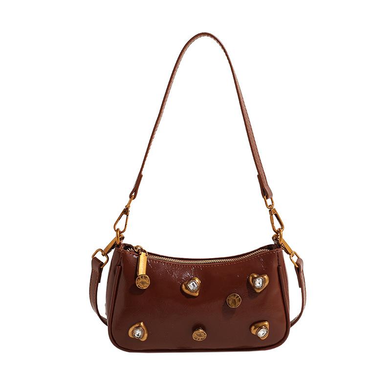 Woman Bags bag 2025 new Korean version of fashion rivets personalized trend women's shoulder crossbody armpit bag