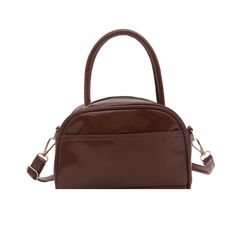

Retro-Texture Bowling Bag: Casual Commute & Niche Design with a Simple, Textured Pillow-Style Shoulder Bag