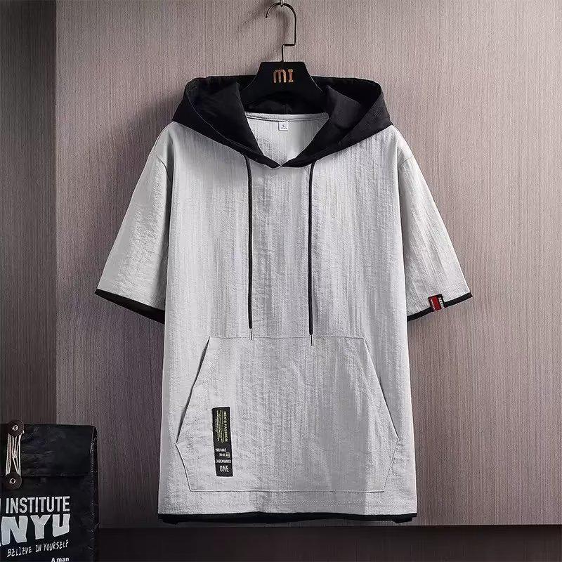 Pánské oversized tričko s kapucí v hongkongském stylu – módní trend léta 2024