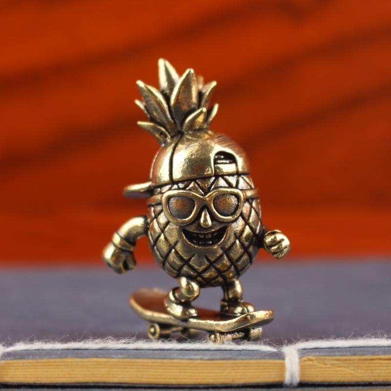 Premium Brass Pineapple Skateboard Figurine Cartoon Fruit Sculpture for Home Living Room Desk Decor Housewarming Gift one size