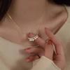 French Retro Crescent Pearl Necklace - Fashionable Irregular Clavicle Chain for Women in 2026