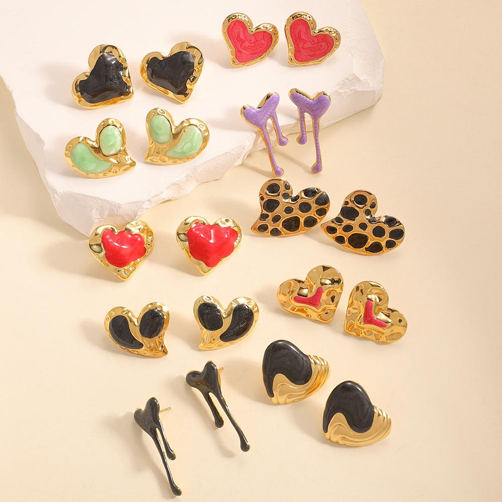Japan and Korea simple design love stud earrings niche versatile hollow earrings stainless steel dripping oil cold wind women's earrings