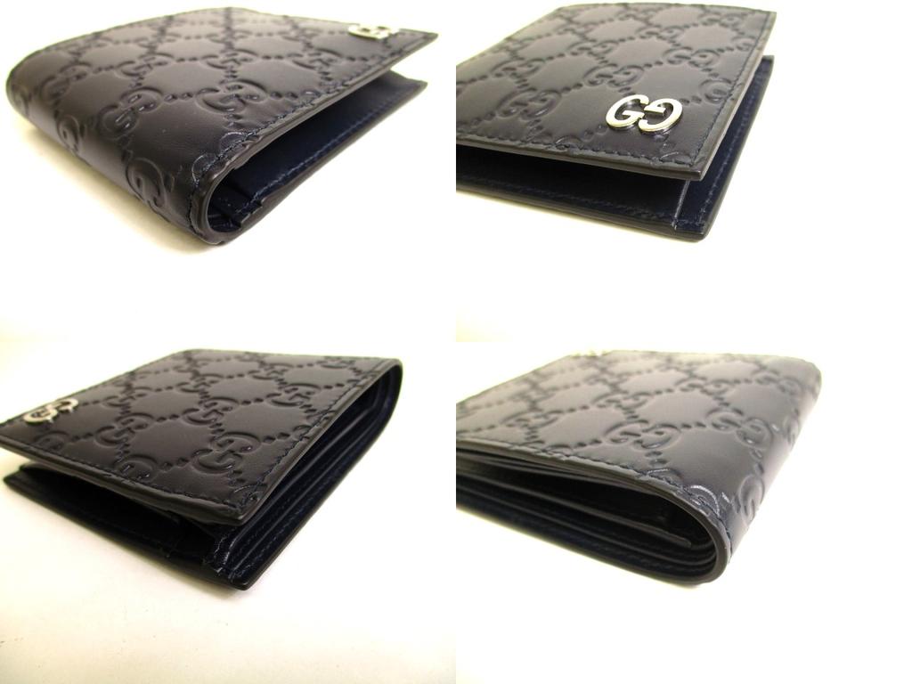 Autentyczny portfel GUCCI GG Metal Guccissima Granatowy Skórzany Podwójnie Składany #9947 Otwarte pudełko