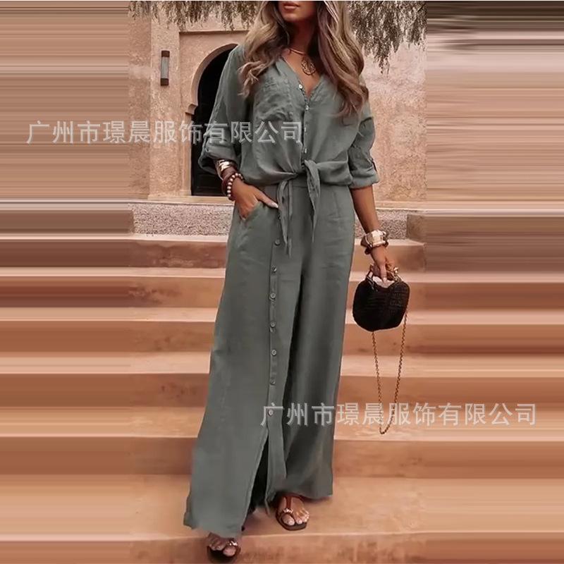 

Женская светло-серая рубашка на пуговицах с узлом, брюки широкого кроя, боковой разрез и детали на пуговицах 3XL зелёный