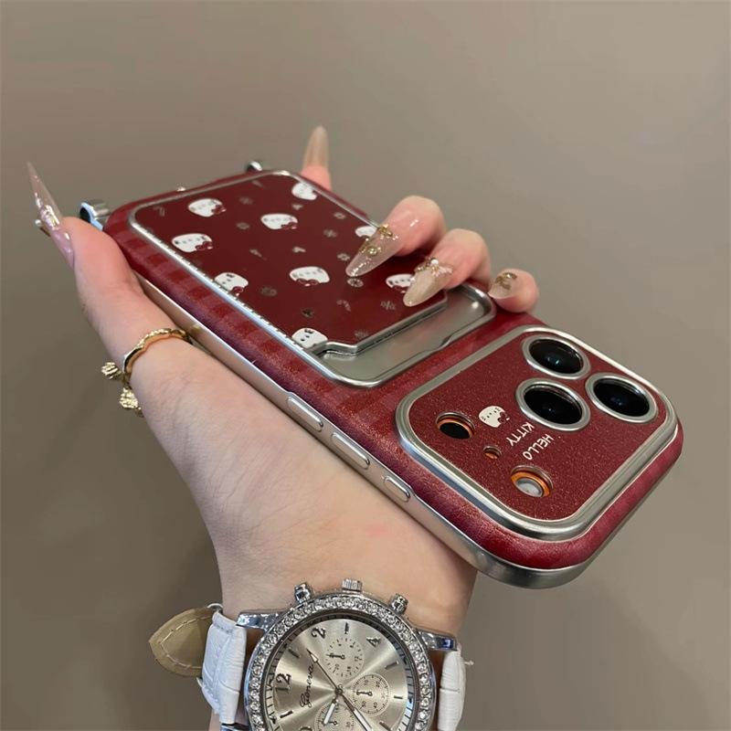 Snowflake KT cat applies to iPhone17 Pro mobile phone case Apple 16 Pro New Year 15 Pro red 14 Pro card bag