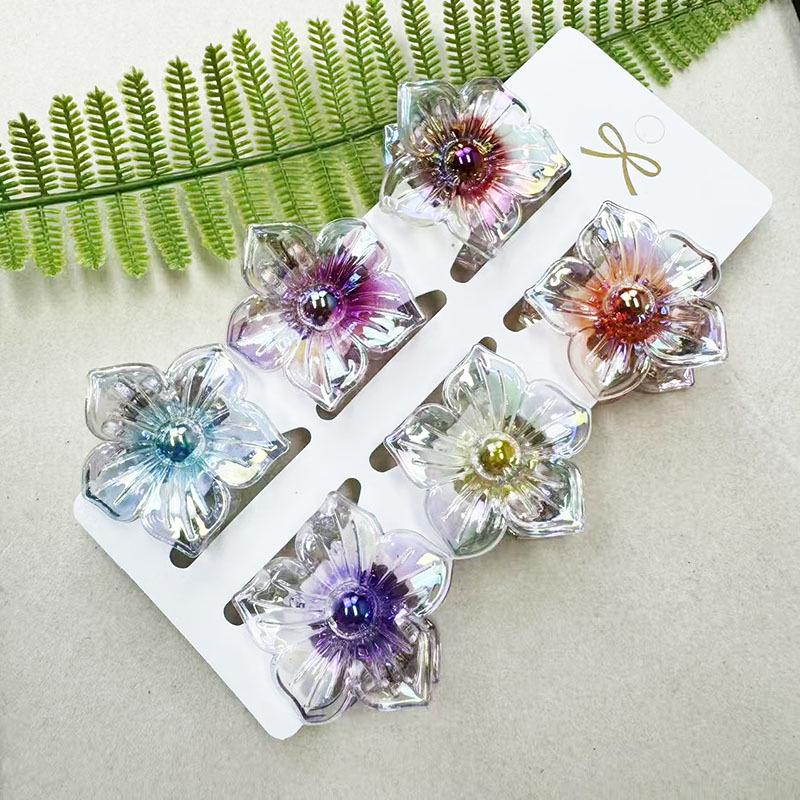 European & American 4CM Frangipani Claw Clip Hairpin - Fashionable Vacation Floral Accessory.