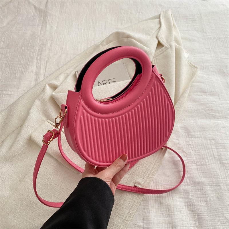 Solid color handbag women's 2025 early new fashion casual messenger bag portable small bag