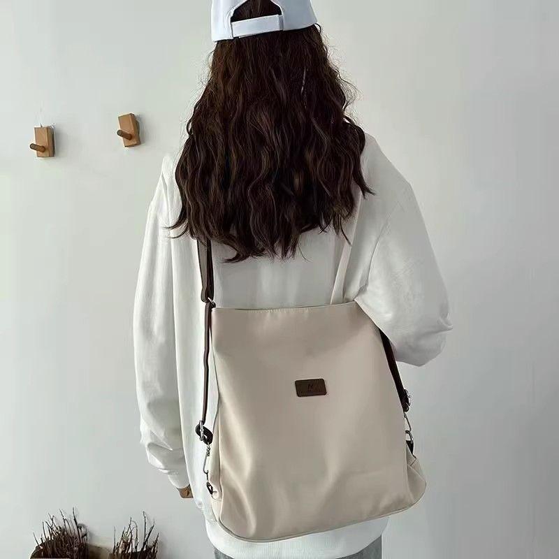 

Three-purpose backpack new backpack schoolbag female college student canvas bag female shoulder messenger bag popular белый