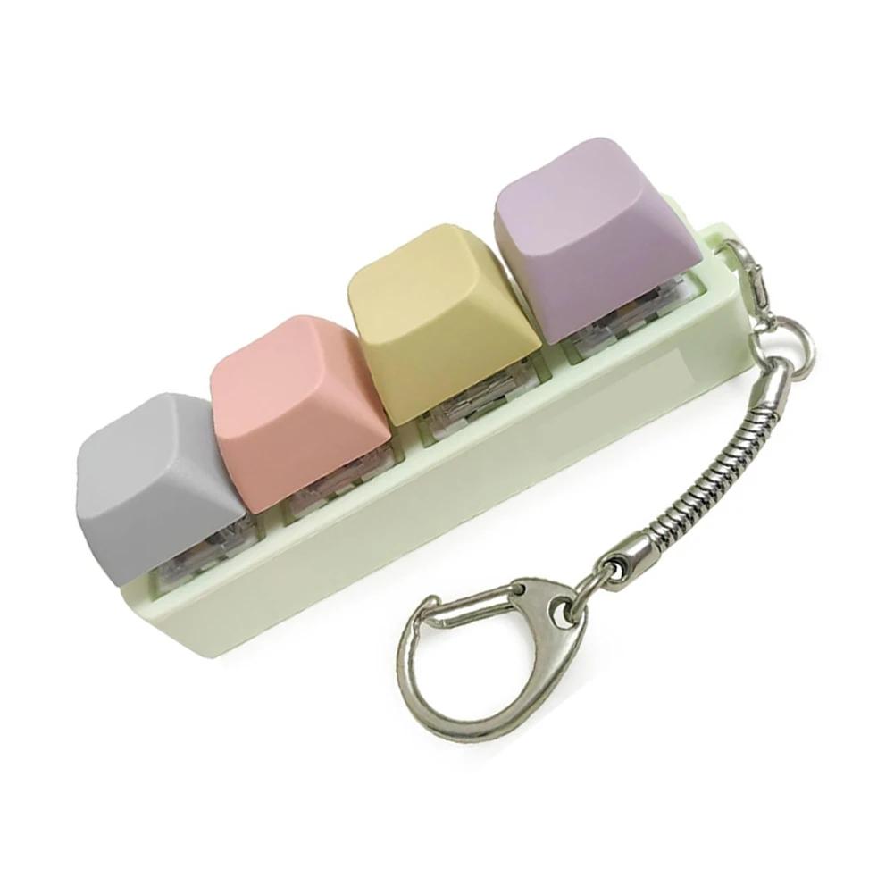 4-Tasten-Tastatur-Tasten-Spielzeug Party Stressabbau DIY Fidget-Tasten-Kappe Fidget-Schlüsselanhänger Tastatur-Schlüsselanhänger Spielzeug Finger-Tastatur