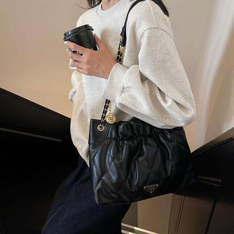 Xiaoxiangfeng Rhombus-Ketten-Bucket-Bag Damen 2025 neue trendige Mode einfarbige Tragetasche große Kapazität Achseltasche