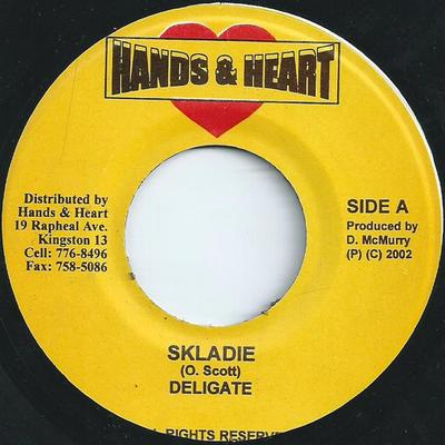 7inch Record DELEGATE / SPRAGGA BENZ - Skladie / Rasta Run Di World NONE Hands & Heart 2002 Jamaica Reggae, Ska & Dub Used