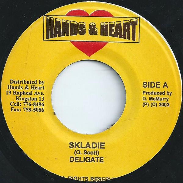 

7inch Record DELEGATE / SPRAGGA BENZ - Skladie / Rasta Run Di World NONE Hands & Heart 2002 Jamaica Reggae, Ska & Dub Used