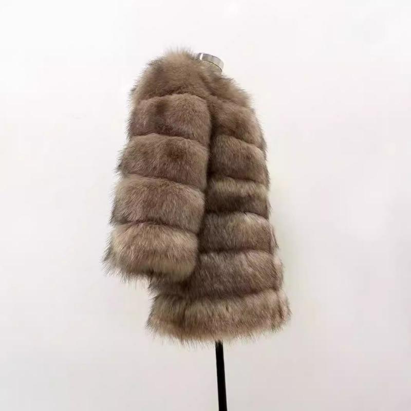 Seven-section splicing jacket women's new autumn and winter clothing temperament fashionable artificial fur imitation fox hair thermal coat
