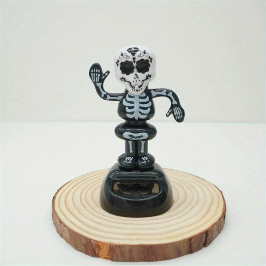 

1PC Auto Trinket Accessories Fashionable Solar Power Swinging Skull Doll Creative Shaking Head Skeleton Car Decoration чёрный