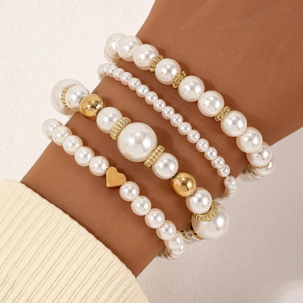 Set di 4 Braccialetti con Perle a Forma di Cuore e Perline per Donna
