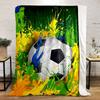 A Soccer Ball Surrounded by Dynamic Splashes of Yellow, Green, and Blue. for All Seasons Blanket Lunch Break Throw Gift