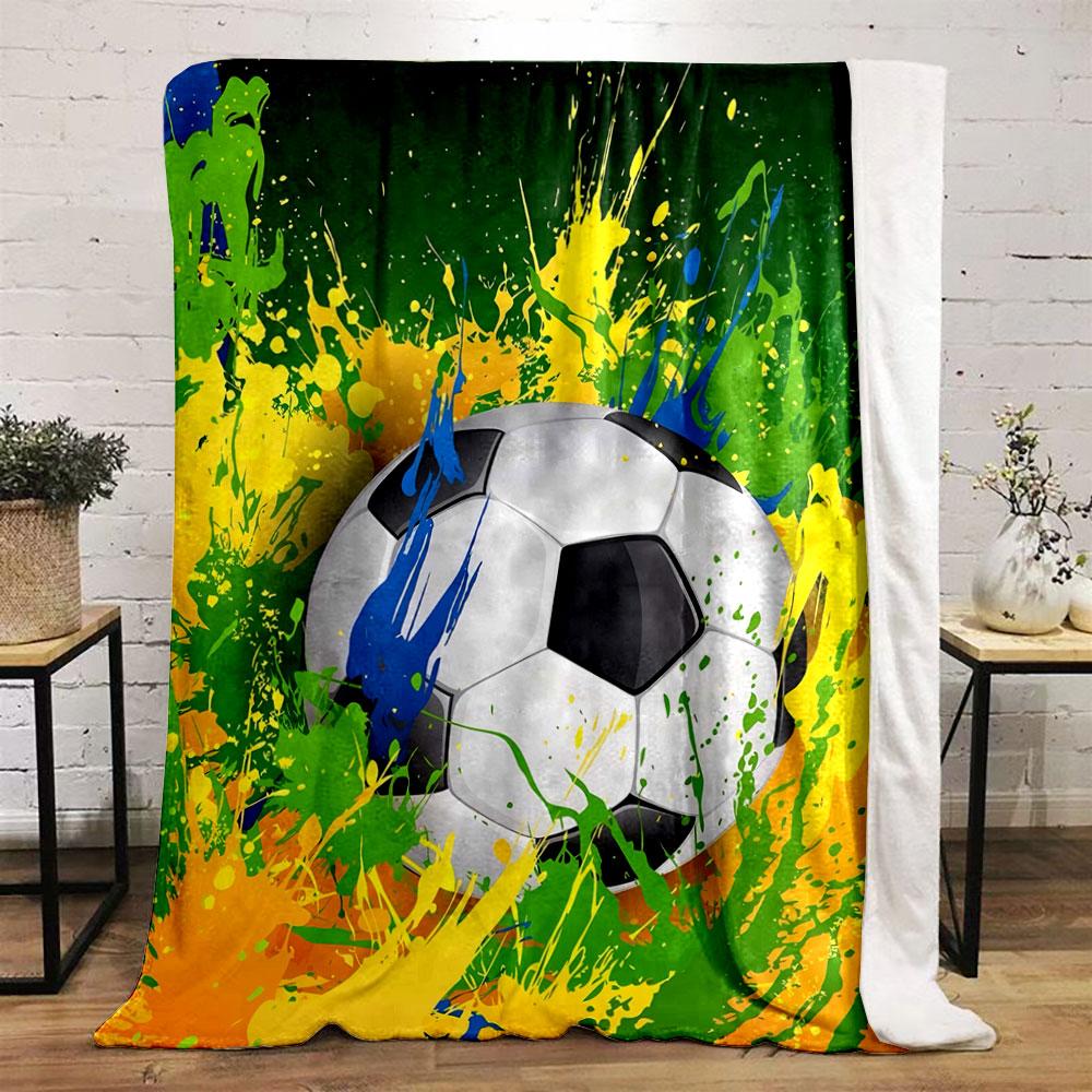A Soccer Ball Surrounded by Dynamic Splashes of Yellow, Green, and Blue. for All Seasons Blanket Lunch Break Throw Gift