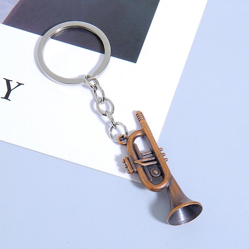 Winziger Saxophon-förmiger Schlüsselanhänger Hochwertige Metallkonstruktion Tolles Geschenk für einen Freund Saxophon-Schlüsselanhänger Taschenanhänger