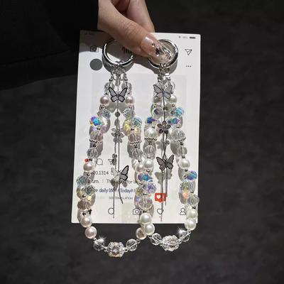 Chaîne de téléphone portable populaire avec pompon en perle et cristal en forme de papillon, bracelet, pendentif pour sac à main, porte-clés, étui de téléphone portable lumière de luxe, cordon