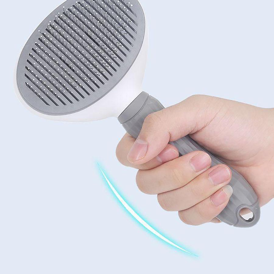 

One click pet hair removal and cleaning comb, rounded comb for massaging pets without damaging the skin светло-серый