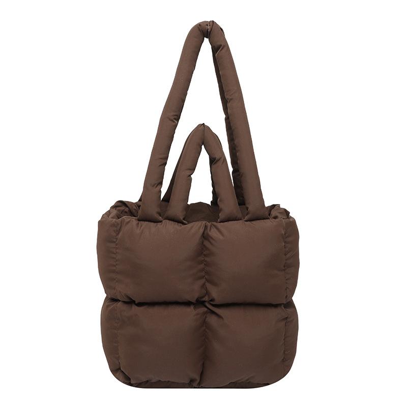 

Fashion women s hand carry down bag simple niche versatile women s bag design sense 2025 spring and summer new bread handbag 25*25*13 коричневый