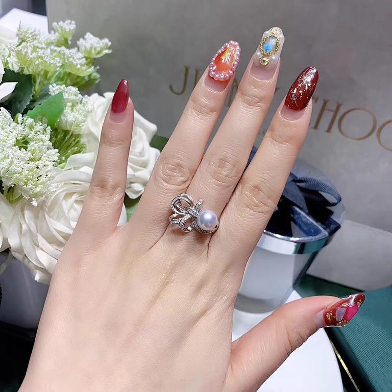 

Fashion Bow Silk Full Diamond Zir*****Pen Ring Cold Wind French High Sense Light Luxury Index Finger Ring Women