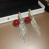 European and American pearl petal fringed earrings light luxury high-end stud earrings temperament versatile earrings design sense niche