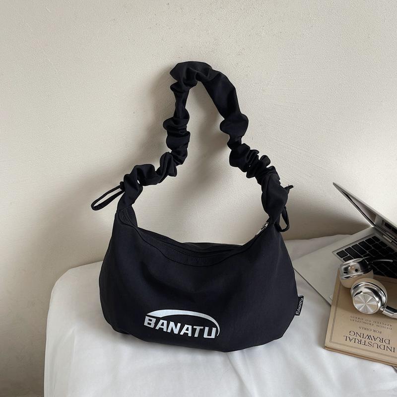 

Casual versatile dumpling bag New commuter shoulder bag Niche light sports messenger bag