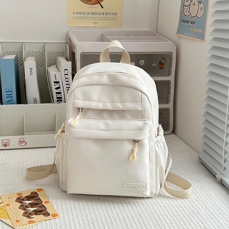 Leisure campus solid color high school student schoolbag new small fresh nylon travel backpack outside
