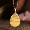 Elegant Water Drop Stone Pendant Necklace for Women, Non-Fading Gold Clavicle Accessory, Light Luxury Design.