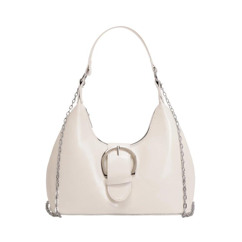 Solid color crescent-shaped hobo bag with metal D-ring embellishment, elegant underarm bag, versatile women's handbag for dates and everyday wear.