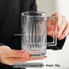 Thickened Glass Cup with Handle: Ideal for Water, Coffee, Tea, or Milk.