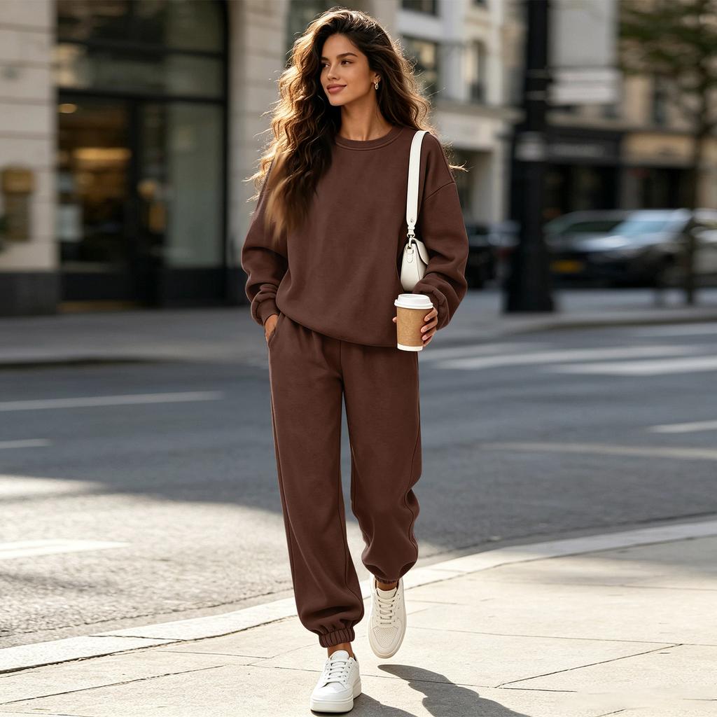 Completo da ginnastica da donna a 2 pezzi con pantaloni a gamba larga per un uso casual quotidiano