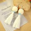 Bohemian retro pom-pom fringed earrings women's vacation long temperament niche personality earrings