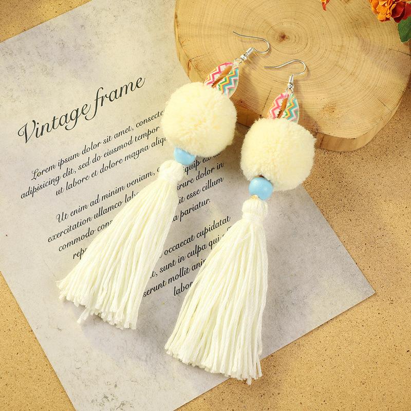 Bohemian retro pom-pom fringed earrings women's vacation long temperament niche personality earrings