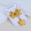 Retro Gold Flower Earrings & Necklace Set: Unique Design for Personal Style