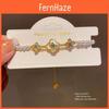 Elegant Floral Hand Chain With Imitation Pearl And Gold Finish For Womens Accessories