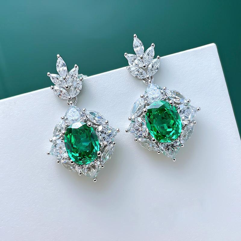 Oval green zircon halo earrings