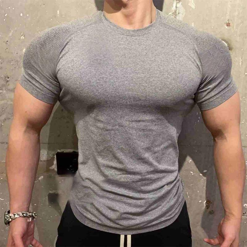 

Men Seamless Crew Neck T Shirt Slim Fit Short Sleeve Stretch Workout Top For Gym And Casual Wear M сірий
