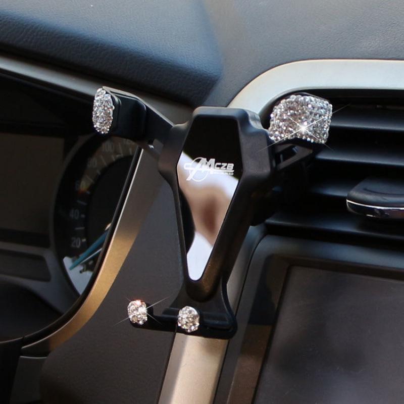 

Универсальный держатель для телефона в автомобиль с креплением на воздуховод и присоской со стразами