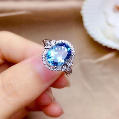 Elegant Swiss Blue Topaz Oval Engagement Ring for Women with Micro Pave Setting