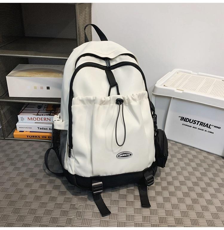 

Повсякденний рюкзак рюкзак новий великої місткості день хлопчики студенти коледжу однотонний шкільний портфель мода білий